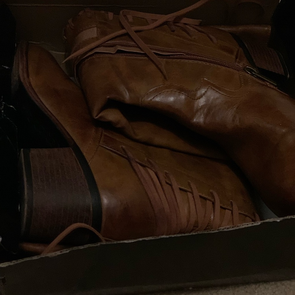 Torrid Lace Up in the back Boots. Never worn!